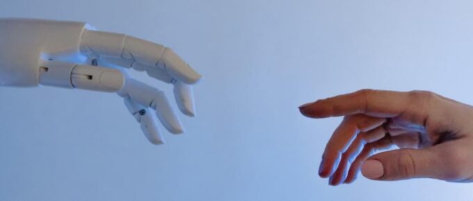 Person Reaching Out to a Robot. Study artificial intelligence at IU