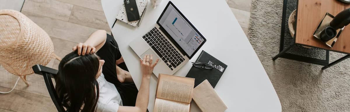 Easy Online Jobs for Students Abroad. Image of woman comfortably working from home.